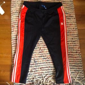 blue and red adidas joggers